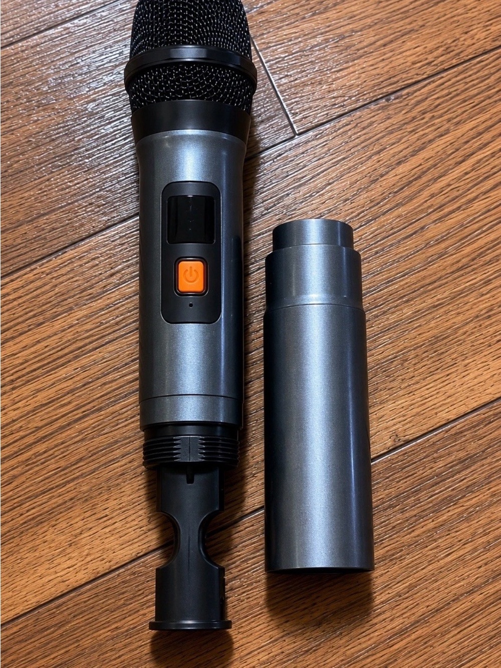 Source Unknown Metallic Gray Handheld Microphone with Orange Power Button